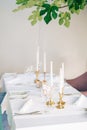 Candles on the table in the restaurant. Table setting in a cafe. Royalty Free Stock Photo