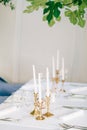 Candles on the table in the restaurant. Table setting in a cafe. Royalty Free Stock Photo