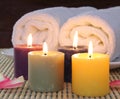 Candles before towels Royalty Free Stock Photo