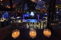 Candles and tulip flowers decoration at night, indoor luxury wedding with low light romantic ambient