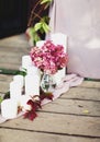 Candles and a vase with flowers