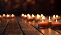 candles with warm tone lighting on wooden floor. generative AI