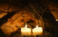 Candles, wood table on background