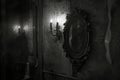 Candlestick and mirror on the wall. Black and white photo. Royalty Free Stock Photo