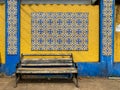 Colorful vintage Portuguese era mosaic tiles on a wall in the Goan town of Candolim