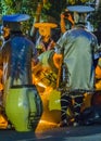 Candombe drummers tempering drums, montevideo, carnival