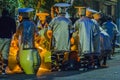 Candombe drummers tempering drums, montevideo, carnival