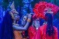 Candombe vedette arranging the hair of a partner, calls parade, montevideo, uruguay Royalty Free Stock Photo