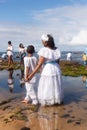 Candomble members and supporters are on Rio Vermelho beach offering gifts to Yemanja