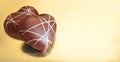 Candy in heart shape on golden background Royalty Free Stock Photo