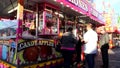 Candy apples booth at Coast Amusements Carnival