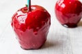 Candy Apples on white wooden surface. Ready to Eat Royalty Free Stock Photo