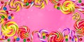 Candy background. Candies on a pink background. Royalty Free Stock Photo