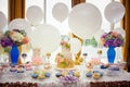 Candy bar on golden wedding party with a lot of different candies, cupcakes, souffle and cakes. Decorated in brown and purple colo Royalty Free Stock Photo