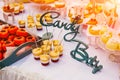 Candy bar, table with colorful sweets, candies, dessert. Buffet with delicious cupcakes, cake pops, biscuits, sweets. Royalty Free Stock Photo