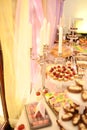 Candy bar. Wedding reception table with sweets Royalty Free Stock Photo