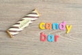 A candy bar with a wrapper with the word candy bar Royalty Free Stock Photo