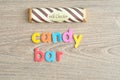 A candy bar with a wrapper with the word candy bar Royalty Free Stock Photo