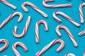 Candy Cane Background on a Blue Background Royalty Free Stock Photo