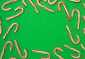 Candy Cane Background on a Green Background Royalty Free Stock Photo