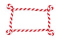 Candy cane border with swirl edges with copy space. Red and white striped frame for christmas design. Unique and unusual hand