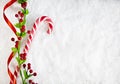 Candy Cane With Christmas Decoration On Snowy Background Royalty Free Stock Photo