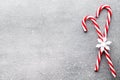 Candy cane. Christmas decors with gray background.