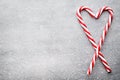 Candy cane. Christmas decors with gray background. Royalty Free Stock Photo