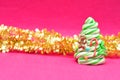 A candy cane Christmas tree displayed with gold tinsel Royalty Free Stock Photo