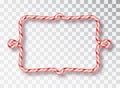 Candy Cane Frame. Blank Christmas border with red and white striped lollipop pattern isolated on transparent background Royalty Free Stock Photo