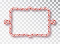 Candy Cane Frame. Blank Christmas border with red and white striped lollipop pattern isolated on transparent background. Holiday Royalty Free Stock Photo