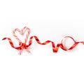 Candy Cane with Red Ribbon Border on White Royalty Free Stock Photo