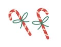 Candy canes. Christmas peppermint sticks, sweet Xmas dessert. Holiday confection, striped candycane with string bow