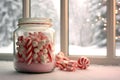 Candy Canes in a Jar with Snowy Backdrop