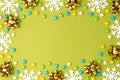 Candy Christmas background. Decorative Christmas border frame of candy shape star and snowflake, gold shiny bow Royalty Free Stock Photo