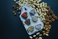 Candy handmade. Sweets without sugar from dried fruits and nuts. Proper nutrition. An assortment of nuts. View from above