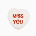 Candy heart on white. Royalty Free Stock Photo