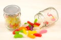 Candy of jar and spilled jelly beans Royalty Free Stock Photo