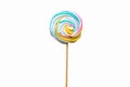 Lollipop candy for kids and adults on a wooden stick on a white background. Sucking sweets for the holiday, sugar confectionery. Royalty Free Stock Photo