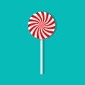 Candy lollipop. Sweet peppermint lollypop on stick. Red-white swirl caramel on cane with shadow on blue background. Christmas icon Royalty Free Stock Photo