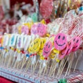 Candy lollipops with smiling emoticon on the stand