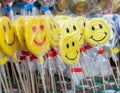 Candy lollipops with smiling emoticon on the stand