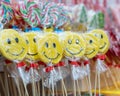 Candy lollipops with smiling emoticon on the stand