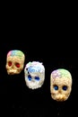 Candy in the shape of a skull made of sugar and amaranth to decorate the offering with candles for the Day of the Faithful Dead an
