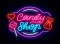 Candy shop neon lettering signboard. Sweet shop label. Lollipop icon on brick wall. Isolated vector illustration