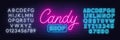 Candy Shop neon sign on brick wall background.