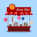 Candy shop, store in city. Sweet candies in glass jar isolated on background. Lollipop, chocolate bar. Vector cartoon design Royalty Free Stock Photo