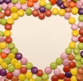 Candy sweets in love heart shape Royalty Free Stock Photo