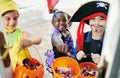 Candy time. Shot of a group of little children going trick-or-treating.