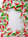 Candycanes border on a white background for Christmas